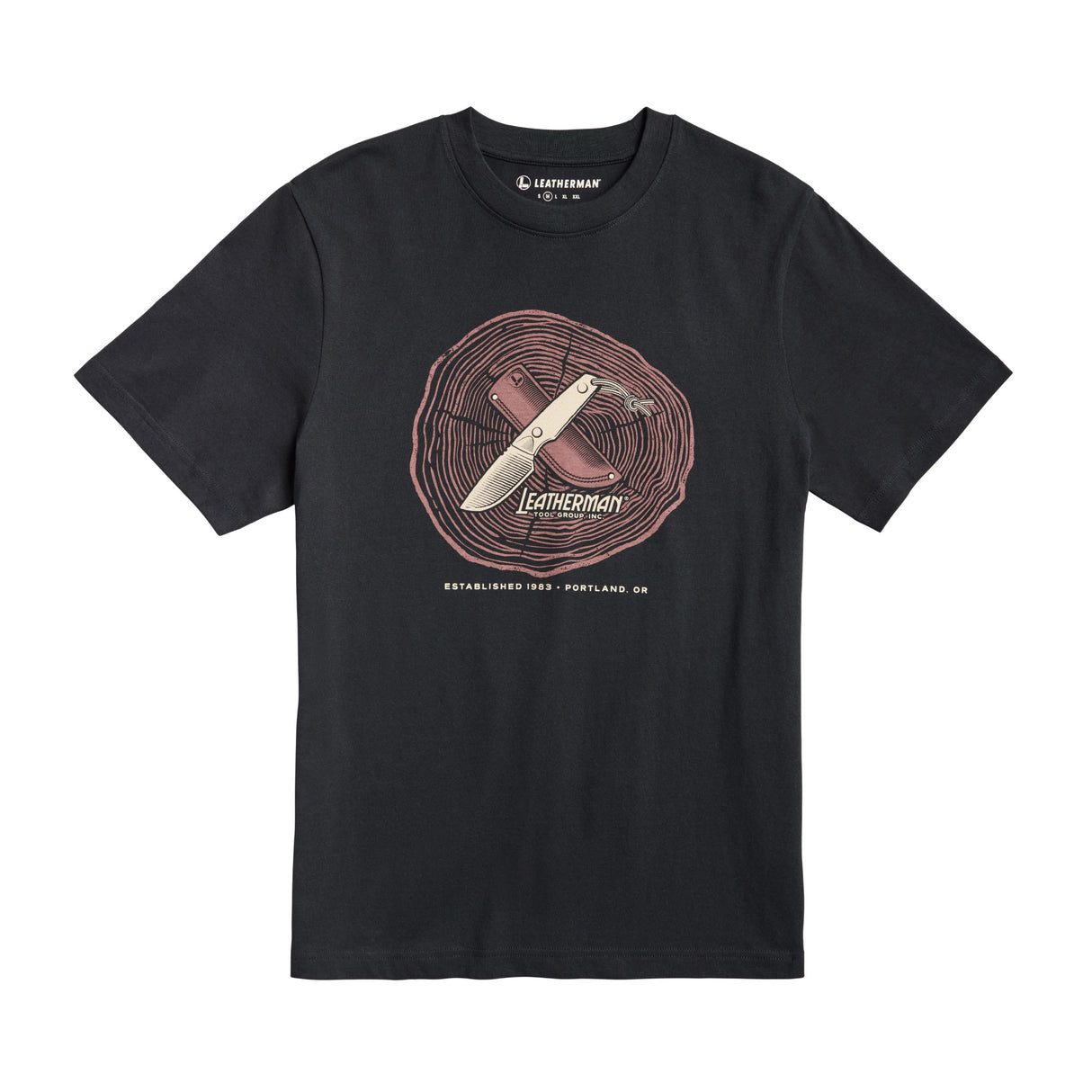 Translation missing: en.Front of the black Leatherman Blade & Grain tee showcasing a fix blade knife and leather sheath on a stump