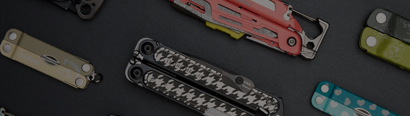 Translation missing: en.A selection of Leatherman multi tools featuring different styles and sizes, is showcased on a table for viewing