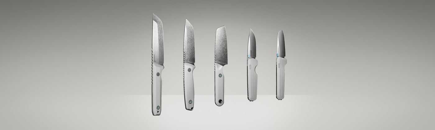 Translation missing: en.Product display image featuring five Leatherman knives in a clean, gradient-lit studio setting. The lineup includes various blade styles and handle orientations, all in a matching alpine white colorway, showcasing both profile and edge-on views to highlight the craftsmanship and design variations