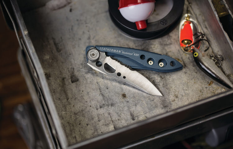 Leatherman KBx sitting open in a tackle box