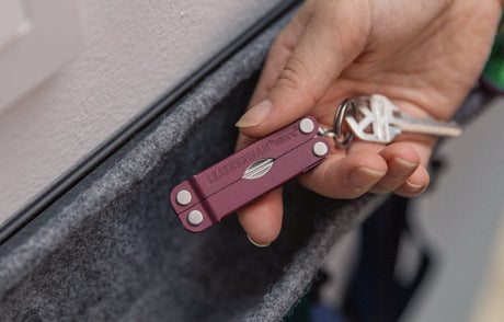 hand holding leatherman micra with key on key ring