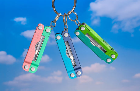Translation missing: fr.Four Skeletool CX on a rock surface, varying colors