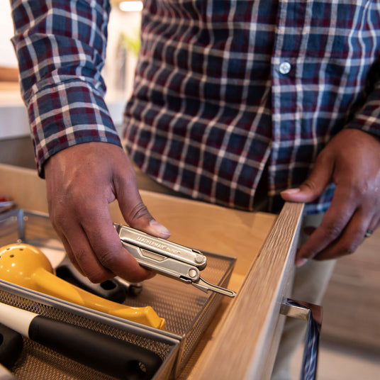 Man using Bond to fix drawer