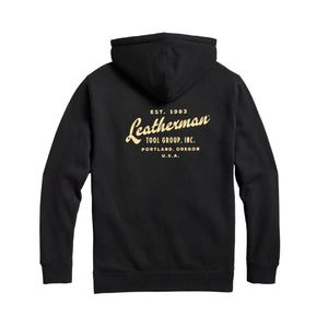 Translation missing: en.Back of the black Leatherman Vintage hoodie. &quot;Leatherman&quot; is in a cursive font. Established 1983