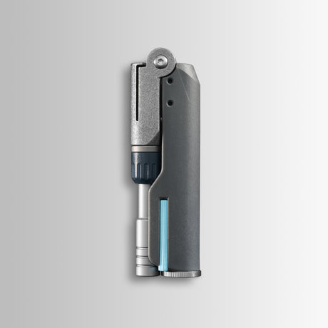 Translation missing: en.Batch #009: Adapter shown folded, with metallic and dark gray components and a slim cylindrical insert