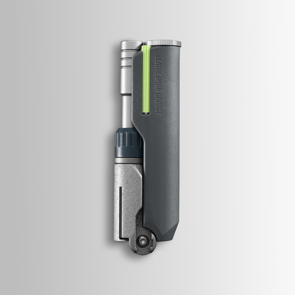 Translation missing: en.Batch #009: Adapter multi-tool in folded form with gray body, metal tip, and neon green accent