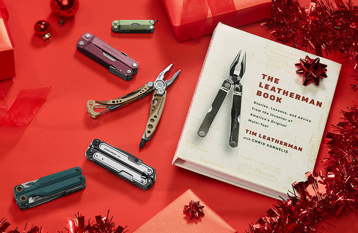 Translation missing: en.Colorful Leatherman multi-tools arranged around 'The Leatherman Book' on a festive red background