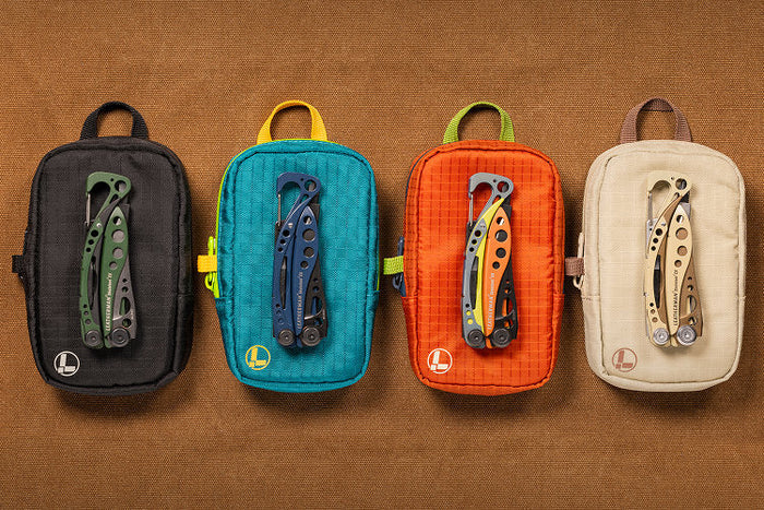 Translation missing: en.Four Leatherman Tool Pouches featuring Skeletool® CX in green, blue, and orange colors showcasing new colorways