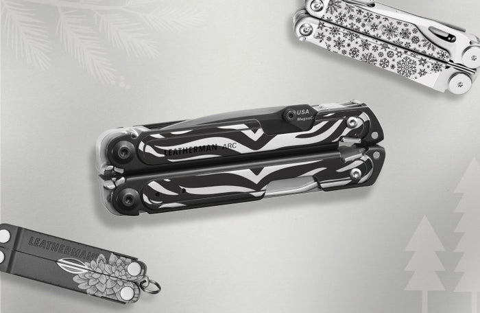 Translation missing: en.Customized Leatherman multi-tools displayed on a light gray background, including a zebra-patterned Arc, a snowflake-engraved Wave+, and a Micra with floral engraving, with subtle holiday tree and pine graphics