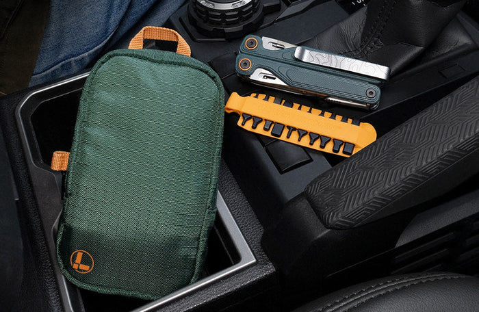 Translation missing: en.Hunter Tool Pouch with Cascadia Wave Alpha multitool and orange bit kit in vehicle console