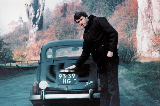 Tim Leatherman next to the fiat he toured Europe in