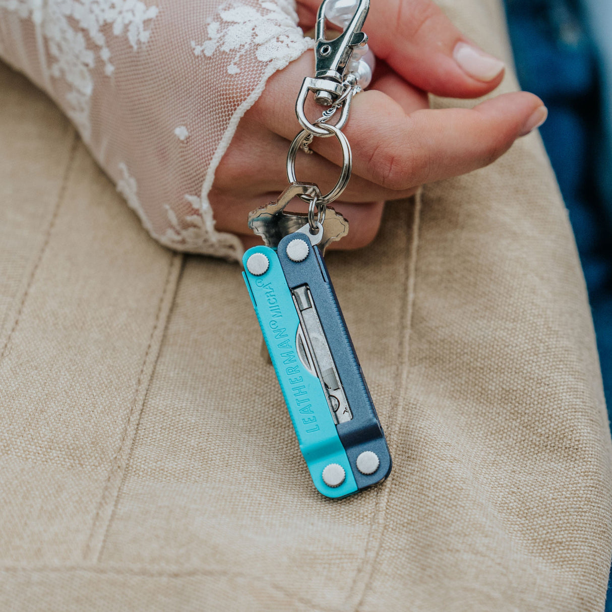 Translation missing: en.Leatherman Micra® in Lavender Mist color attached to a key ring showcasing its compact design